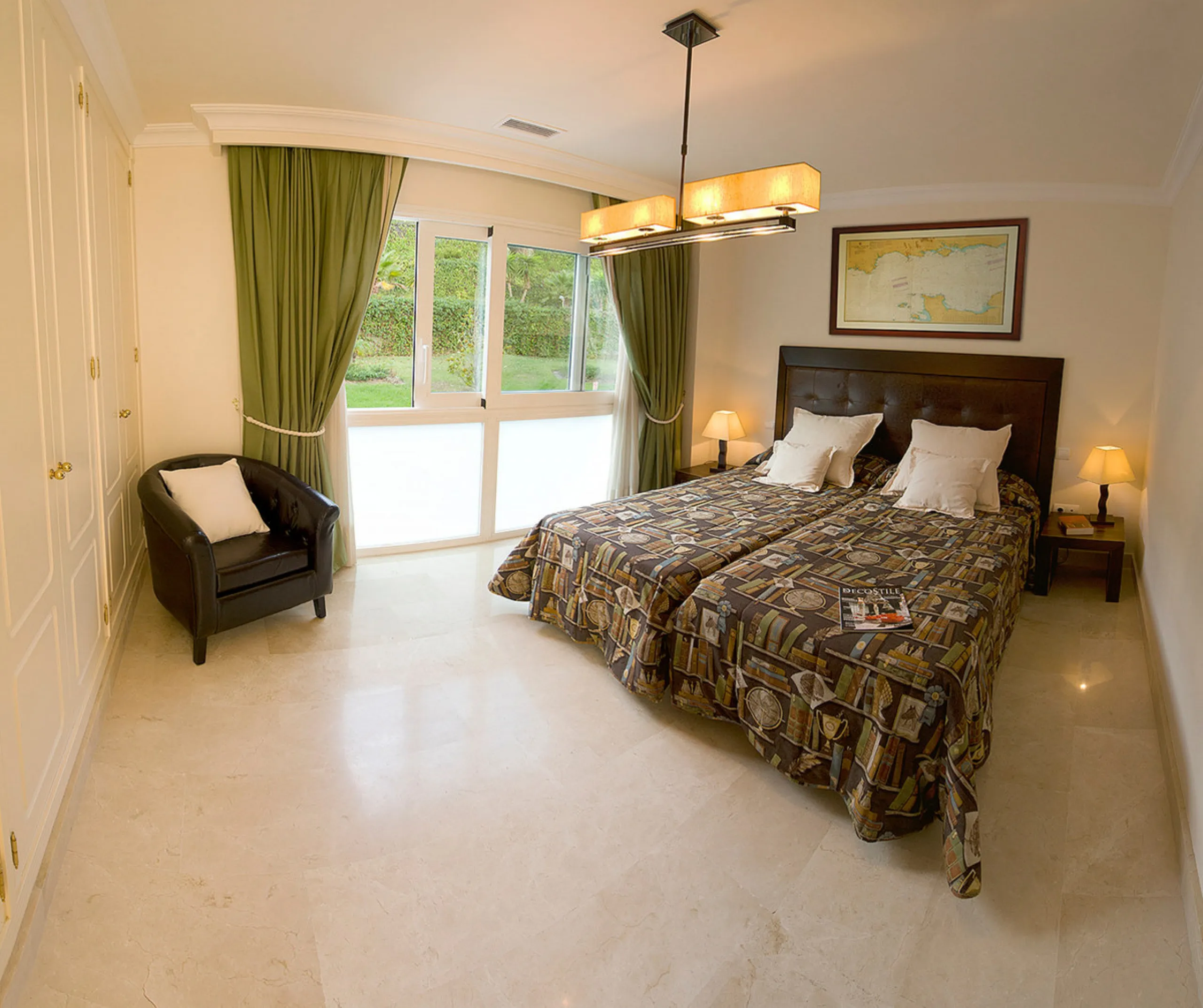 Apartment La Corniche is a luxury 2-bedroom apartment in the heart of Nueva Andalucía's Golf Valley. This gated community offers peace and privacy while being close to world-class golf, fine dining, and Puerto Banús. The home enjoys 180-degree views of th