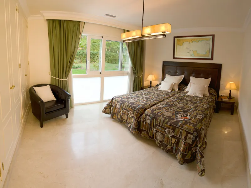 Apartment La Corniche is a luxury 2-bedroom apartment in the heart of Nueva Andalucía's Golf Valley. This gated community offers peace and privacy while being close to world-class golf, fine dining, and Puerto Banús. The home enjoys 180-degree views of th
