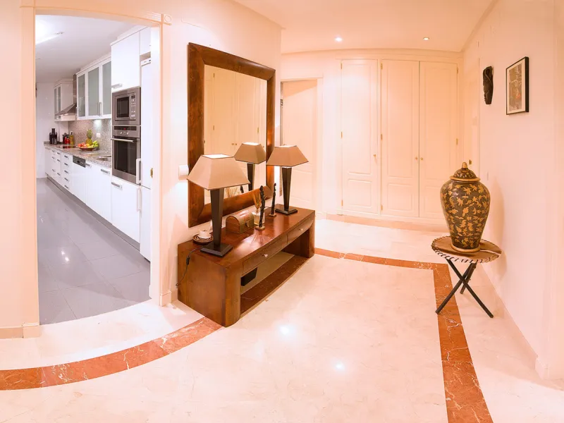 Apartment La Corniche is a luxury 2-bedroom apartment in the heart of Nueva Andalucía's Golf Valley. This gated community offers peace and privacy while being close to world-class golf, fine dining, and Puerto Banús. The home enjoys 180-degree views of th