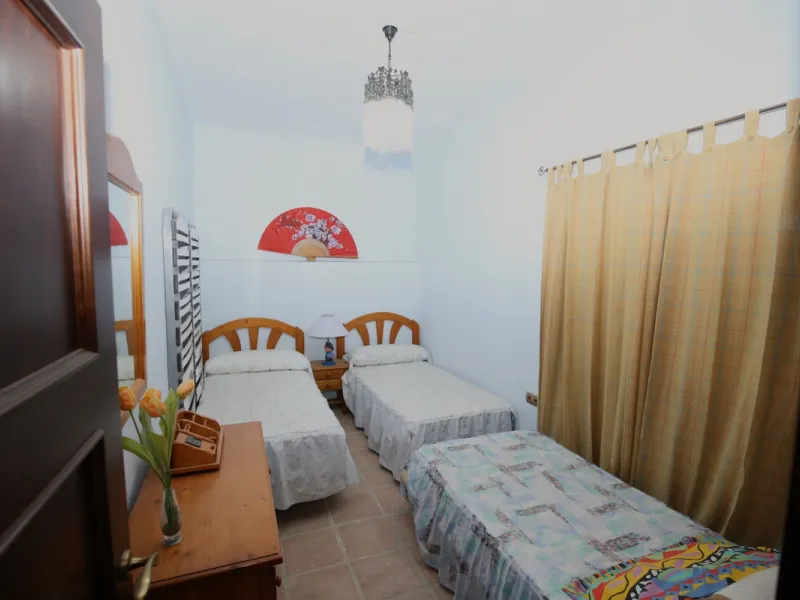 In the picturesque village of Benamargosa, a spacious house with an impressive built area of 472 m2 is available for sale. Its prime location allows easy access on foot to all the amenities the village has to offer, including restaurants, shops, and medic