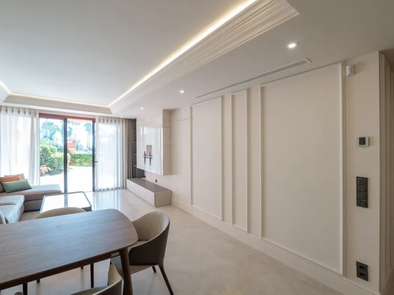 Situated in Cabo Bermejo, an exclusive frontline beach development positioned along the New Golden Mile stretching between San Pedro and Estepona, this recently refurbished ground-floor apartment boasts three bedrooms and two bathrooms, providing a sophis