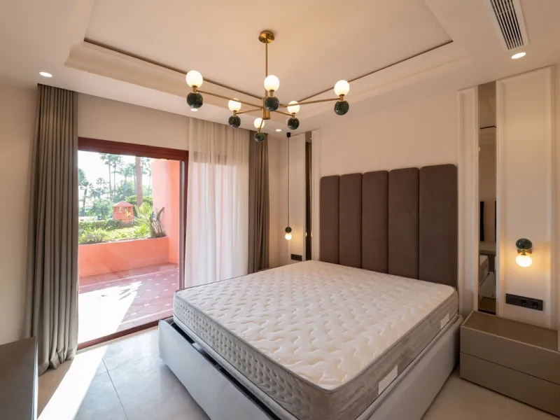Situated in Cabo Bermejo, an exclusive frontline beach development positioned along the New Golden Mile stretching between San Pedro and Estepona, this recently refurbished ground-floor apartment boasts three bedrooms and two bathrooms, providing a sophis