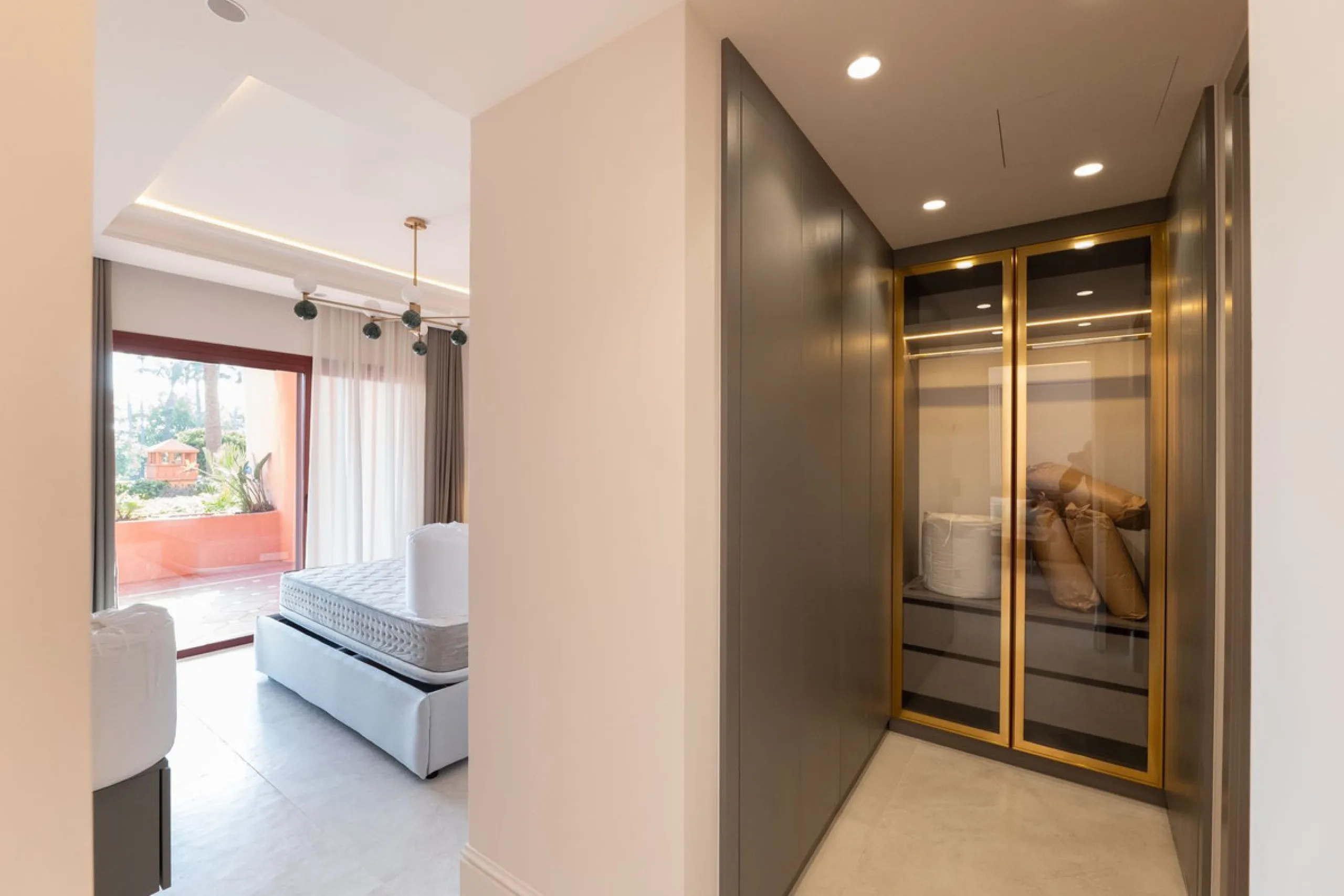 Situated in Cabo Bermejo, an exclusive frontline beach development positioned along the New Golden Mile stretching between San Pedro and Estepona, this recently refurbished ground-floor apartment boasts three bedrooms and two bathrooms, providing a sophis