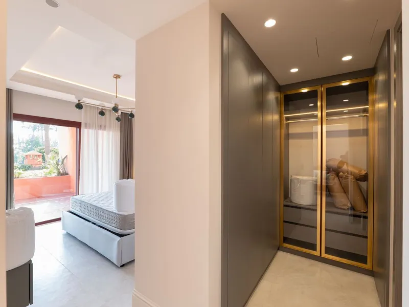 Situated in Cabo Bermejo, an exclusive frontline beach development positioned along the New Golden Mile stretching between San Pedro and Estepona, this recently refurbished ground-floor apartment boasts three bedrooms and two bathrooms, providing a sophis