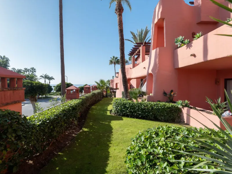 Situated in Cabo Bermejo, an exclusive frontline beach development positioned along the New Golden Mile stretching between San Pedro and Estepona, this recently refurbished ground-floor apartment boasts three bedrooms and two bathrooms, providing a sophis