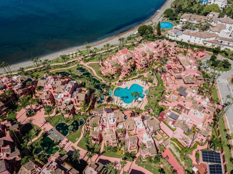 Situated in Cabo Bermejo, an exclusive frontline beach development positioned along the New Golden Mile stretching between San Pedro and Estepona, this recently refurbished ground-floor apartment boasts three bedrooms and two bathrooms, providing a sophis
