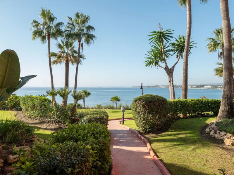 Situated in Cabo Bermejo, an exclusive frontline beach development positioned along the New Golden Mile stretching between San Pedro and Estepona, this recently refurbished ground-floor apartment boasts three bedrooms and two bathrooms, providing a sophis
