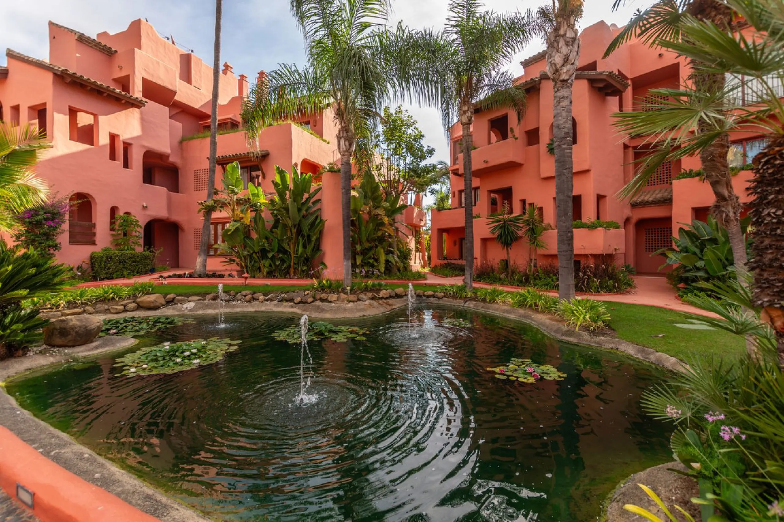 Situated in Cabo Bermejo, an exclusive frontline beach development positioned along the New Golden Mile stretching between San Pedro and Estepona, this recently refurbished ground-floor apartment boasts three bedrooms and two bathrooms, providing a sophis