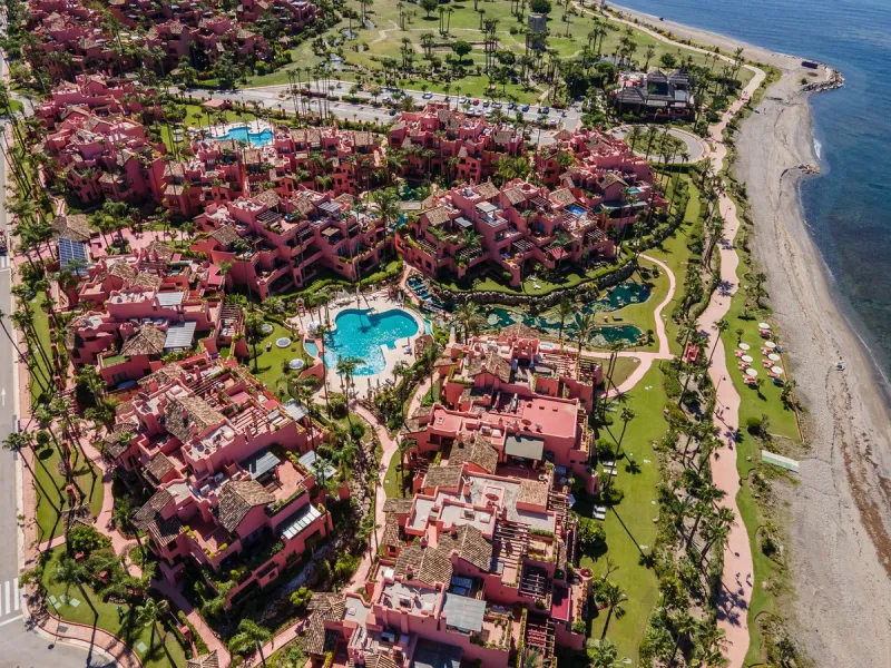 Situated in Cabo Bermejo, an exclusive frontline beach development positioned along the New Golden Mile stretching between San Pedro and Estepona, this recently refurbished ground-floor apartment boasts three bedrooms and two bathrooms, providing a sophis