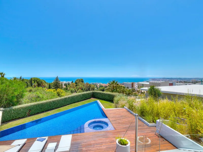 Contemporary designer villa with breathtaking views towards the sea. The villa comprises of two floors with main entrance on the upper level. From the moment you step through the front door, you are struck by the fantastic view thanks to the floor-to-ceil