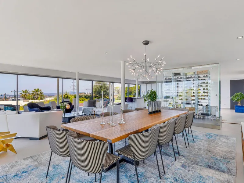 Contemporary designer villa with breathtaking views towards the sea. The villa comprises of two floors with main entrance on the upper level. From the moment you step through the front door, you are struck by the fantastic view thanks to the floor-to-ceil