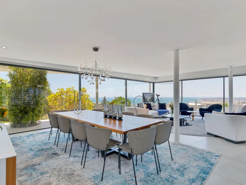Contemporary designer villa with breathtaking views towards the sea. The villa comprises of two floors with main entrance on the upper level. From the moment you step through the front door, you are struck by the fantastic view thanks to the floor-to-ceil