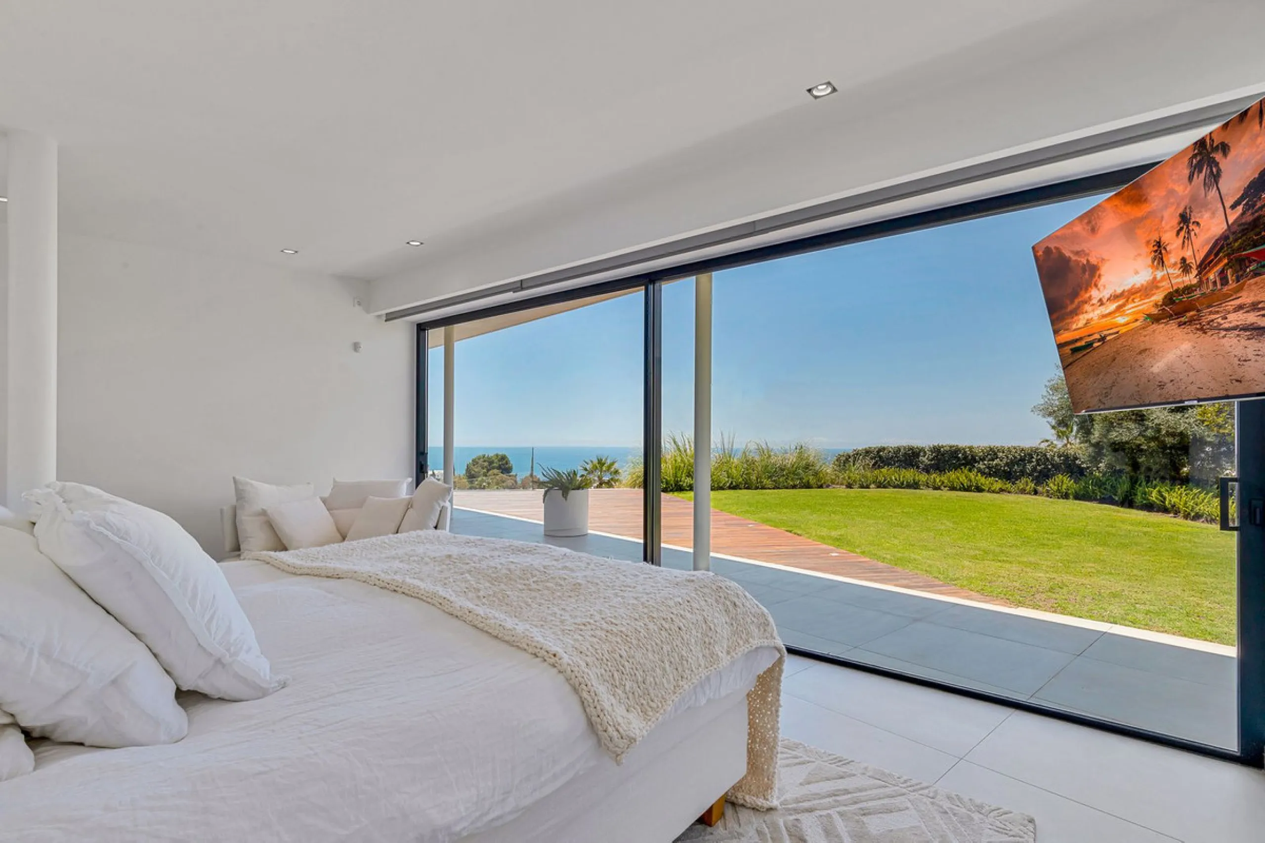 Contemporary designer villa with breathtaking views towards the sea. The villa comprises of two floors with main entrance on the upper level. From the moment you step through the front door, you are struck by the fantastic view thanks to the floor-to-ceil