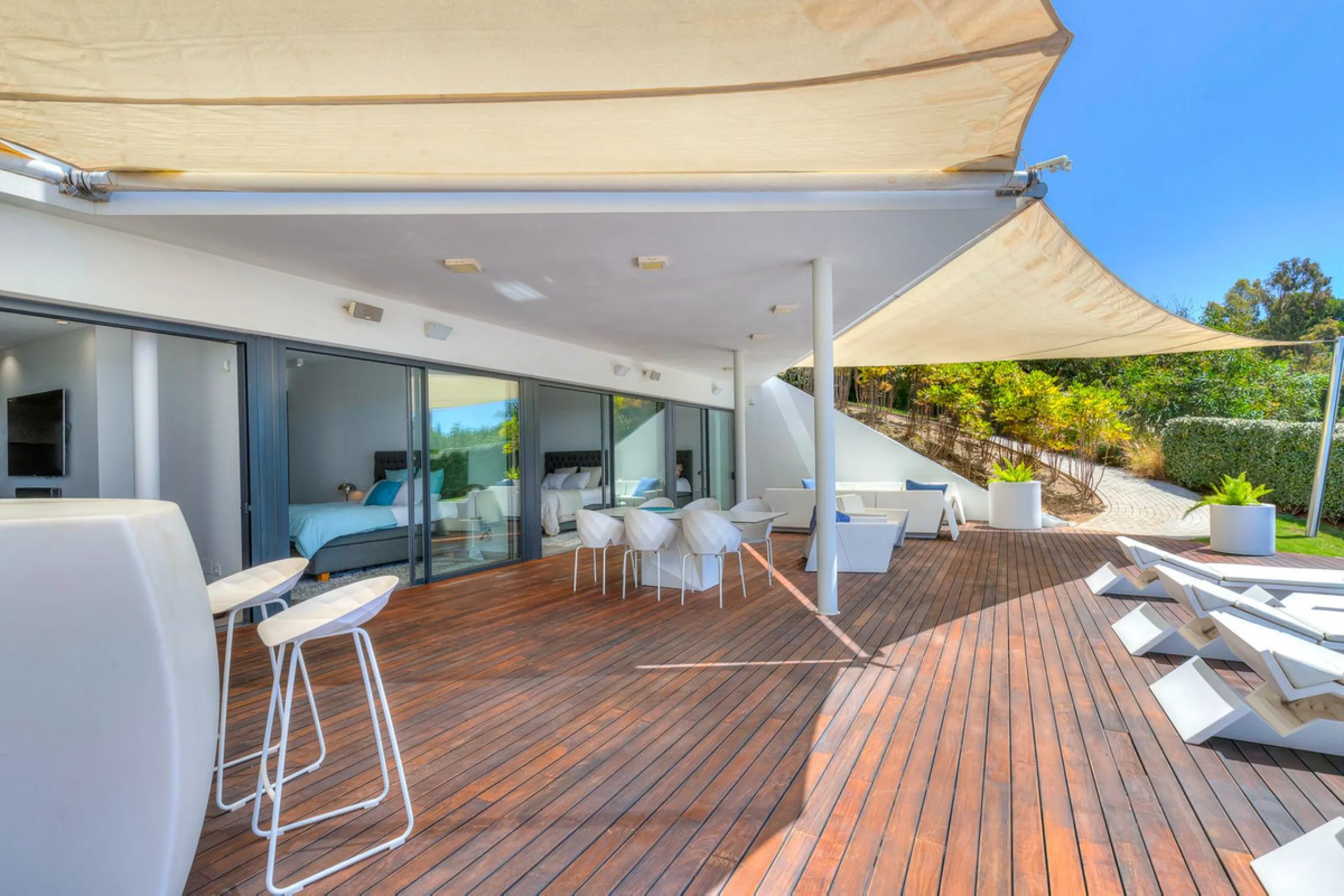 Contemporary designer villa with breathtaking views towards the sea. The villa comprises of two floors with main entrance on the upper level. From the moment you step through the front door, you are struck by the fantastic view thanks to the floor-to-ceil