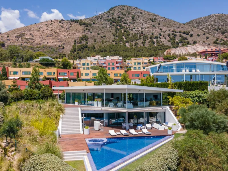 Contemporary designer villa with breathtaking views towards the sea. The villa comprises of two floors with main entrance on the upper level. From the moment you step through the front door, you are struck by the fantastic view thanks to the floor-to-ceil
