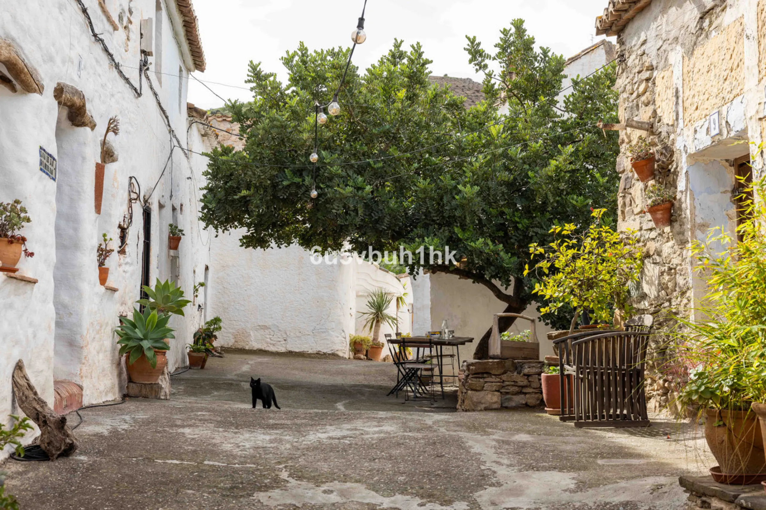 A very rare opportunity to purchase  a complete private village of 14 townhouses situated in what was once a functioning white countryside hamlet overlooking the lake with a lovely cobbled street leading to each house. These beautiful rustic style houses 