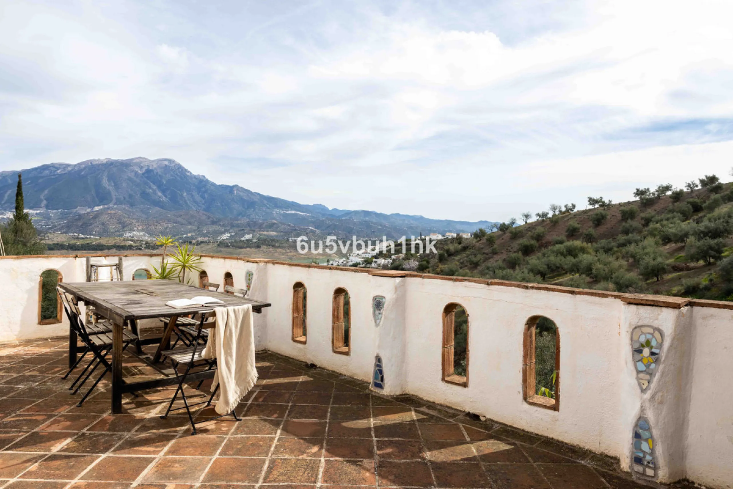 A very rare opportunity to purchase  a complete private village of 14 townhouses situated in what was once a functioning white countryside hamlet overlooking the lake with a lovely cobbled street leading to each house. These beautiful rustic style houses 