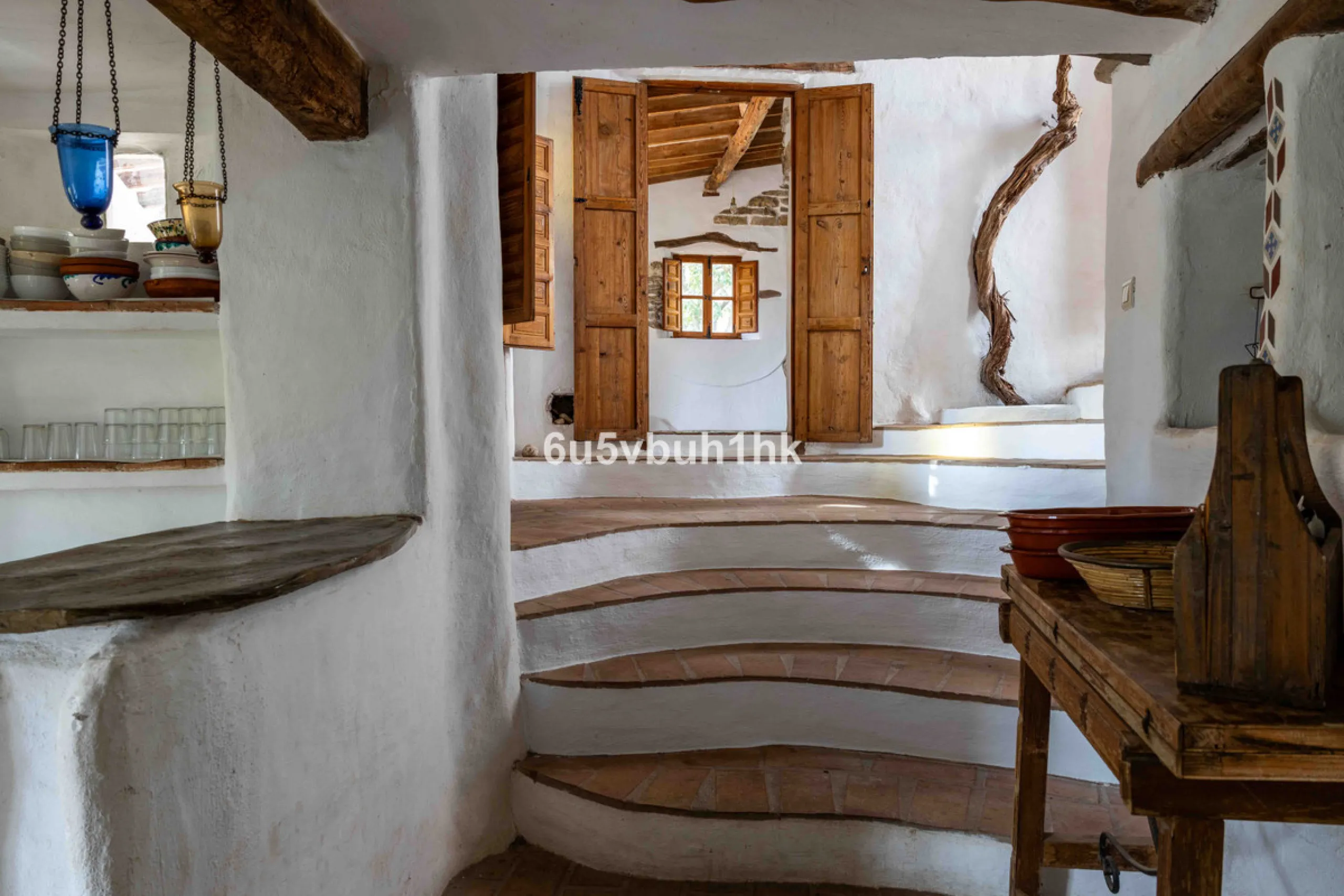 A very rare opportunity to purchase  a complete private village of 14 townhouses situated in what was once a functioning white countryside hamlet overlooking the lake with a lovely cobbled street leading to each house. These beautiful rustic style houses 
