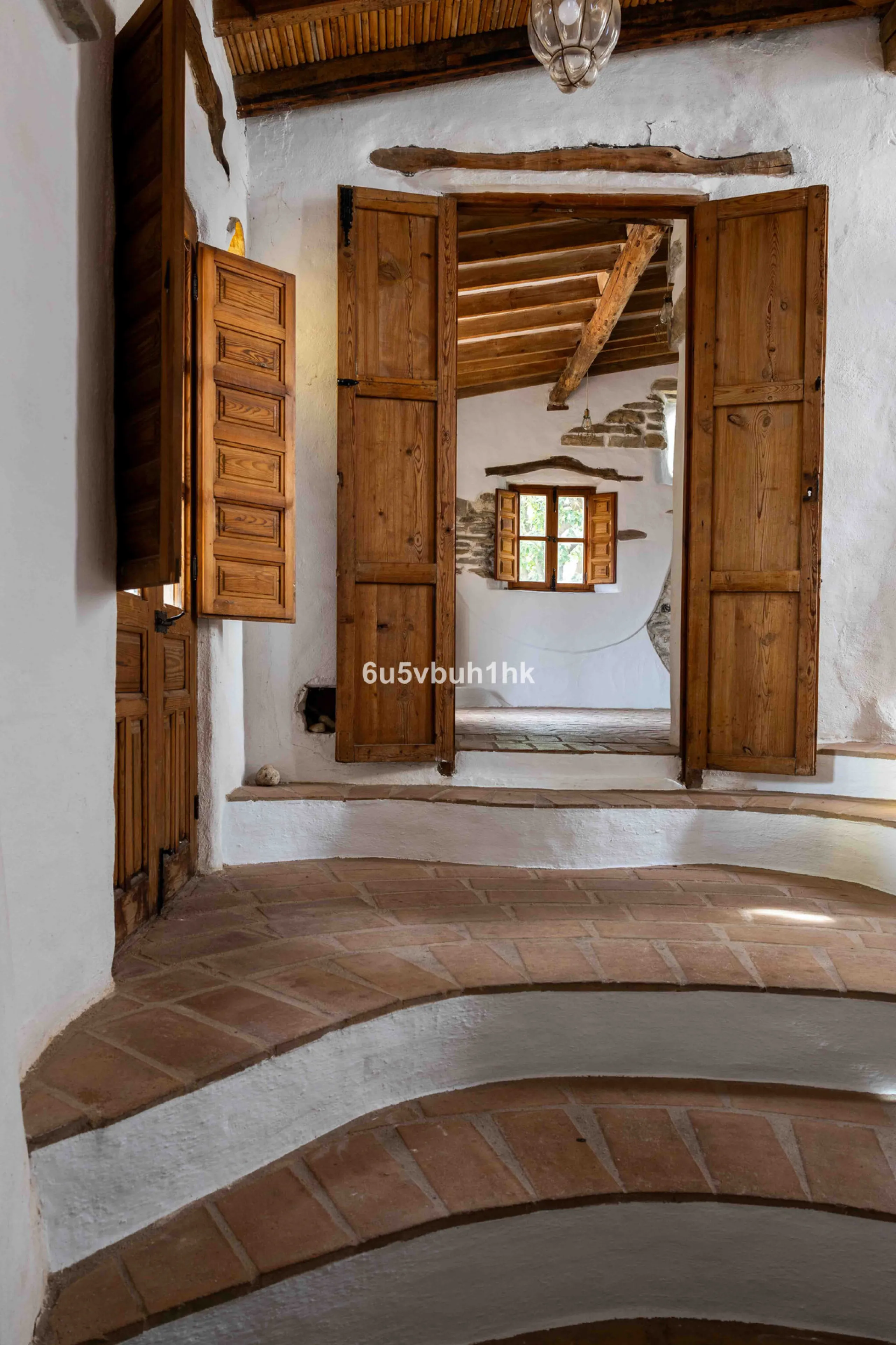 A very rare opportunity to purchase  a complete private village of 14 townhouses situated in what was once a functioning white countryside hamlet overlooking the lake with a lovely cobbled street leading to each house. These beautiful rustic style houses 