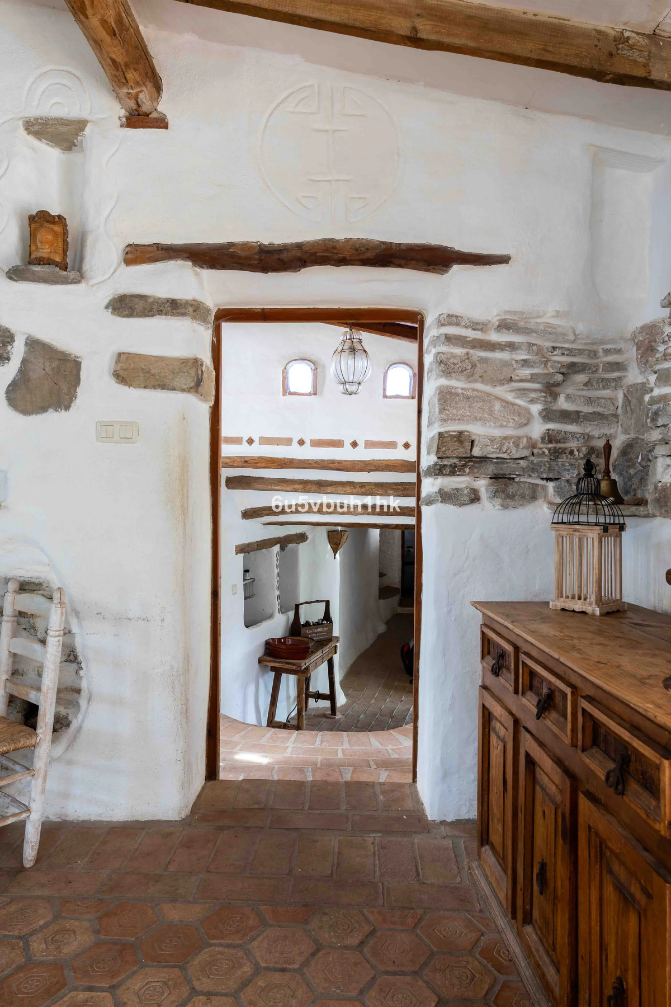 A very rare opportunity to purchase  a complete private village of 14 townhouses situated in what was once a functioning white countryside hamlet overlooking the lake with a lovely cobbled street leading to each house. These beautiful rustic style houses 