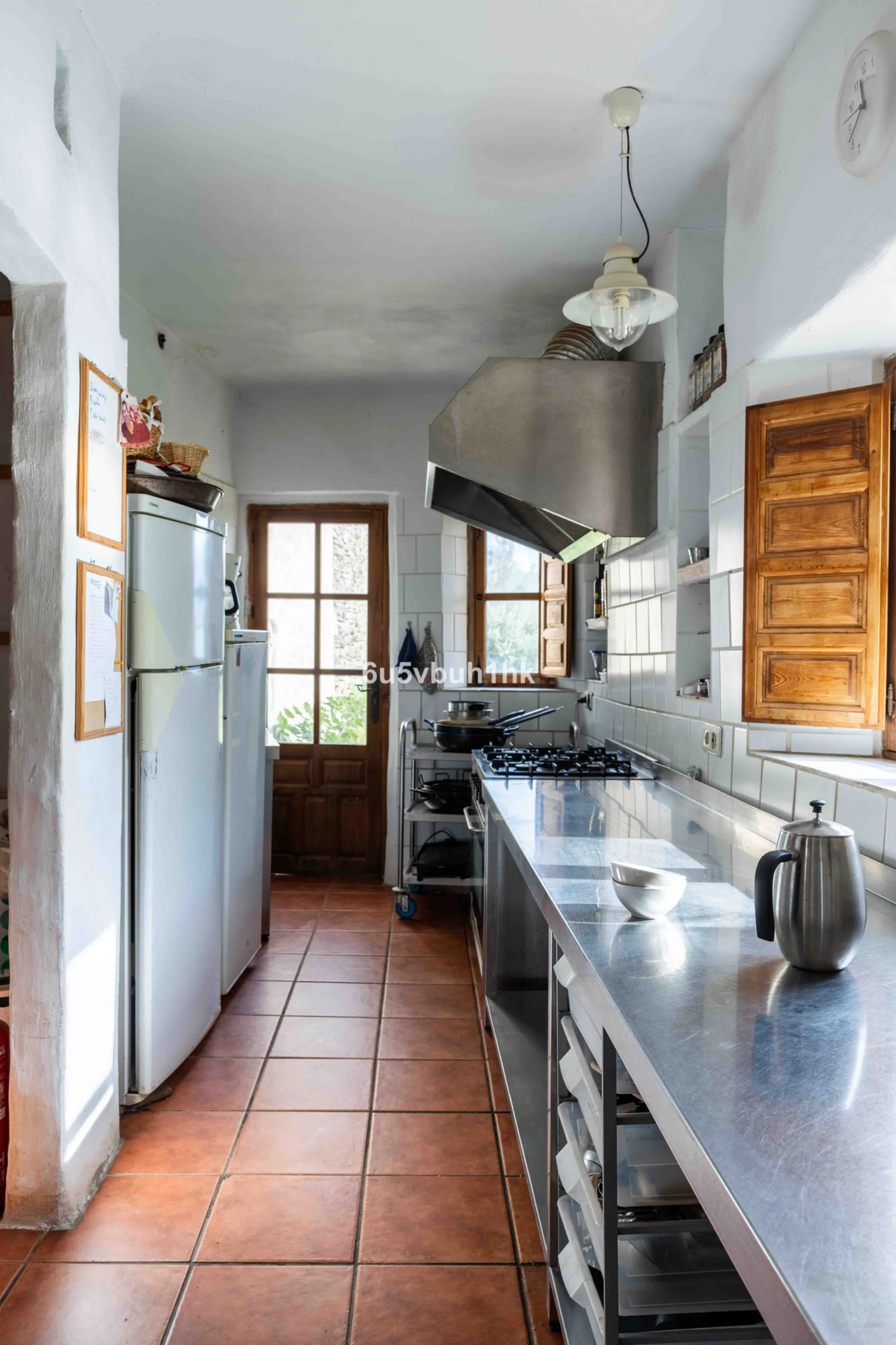 A very rare opportunity to purchase  a complete private village of 14 townhouses situated in what was once a functioning white countryside hamlet overlooking the lake with a lovely cobbled street leading to each house. These beautiful rustic style houses 