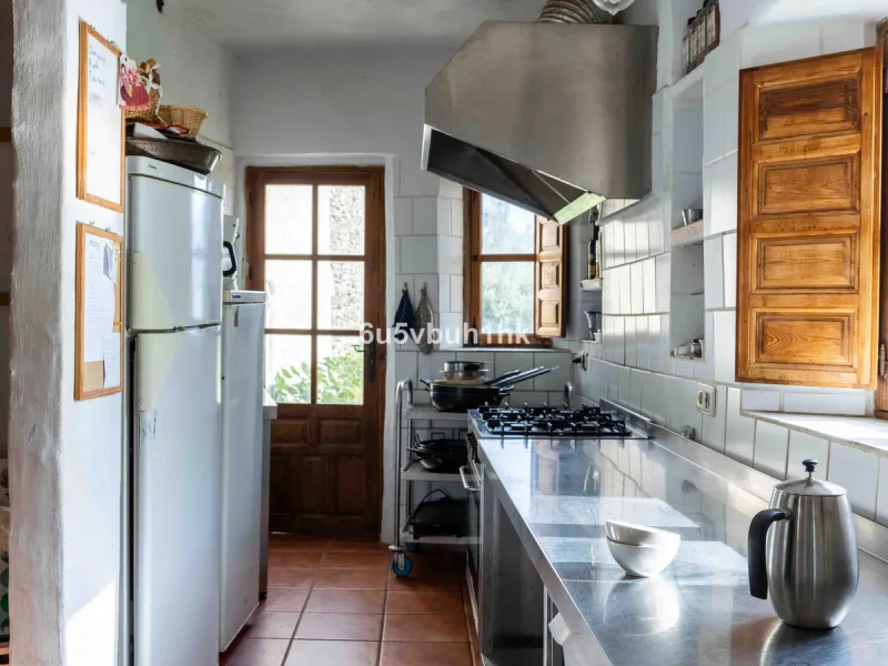 A very rare opportunity to purchase  a complete private village of 14 townhouses situated in what was once a functioning white countryside hamlet overlooking the lake with a lovely cobbled street leading to each house. These beautiful rustic style houses 