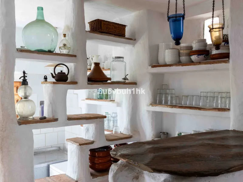A very rare opportunity to purchase  a complete private village of 14 townhouses situated in what was once a functioning white countryside hamlet overlooking the lake with a lovely cobbled street leading to each house. These beautiful rustic style houses 