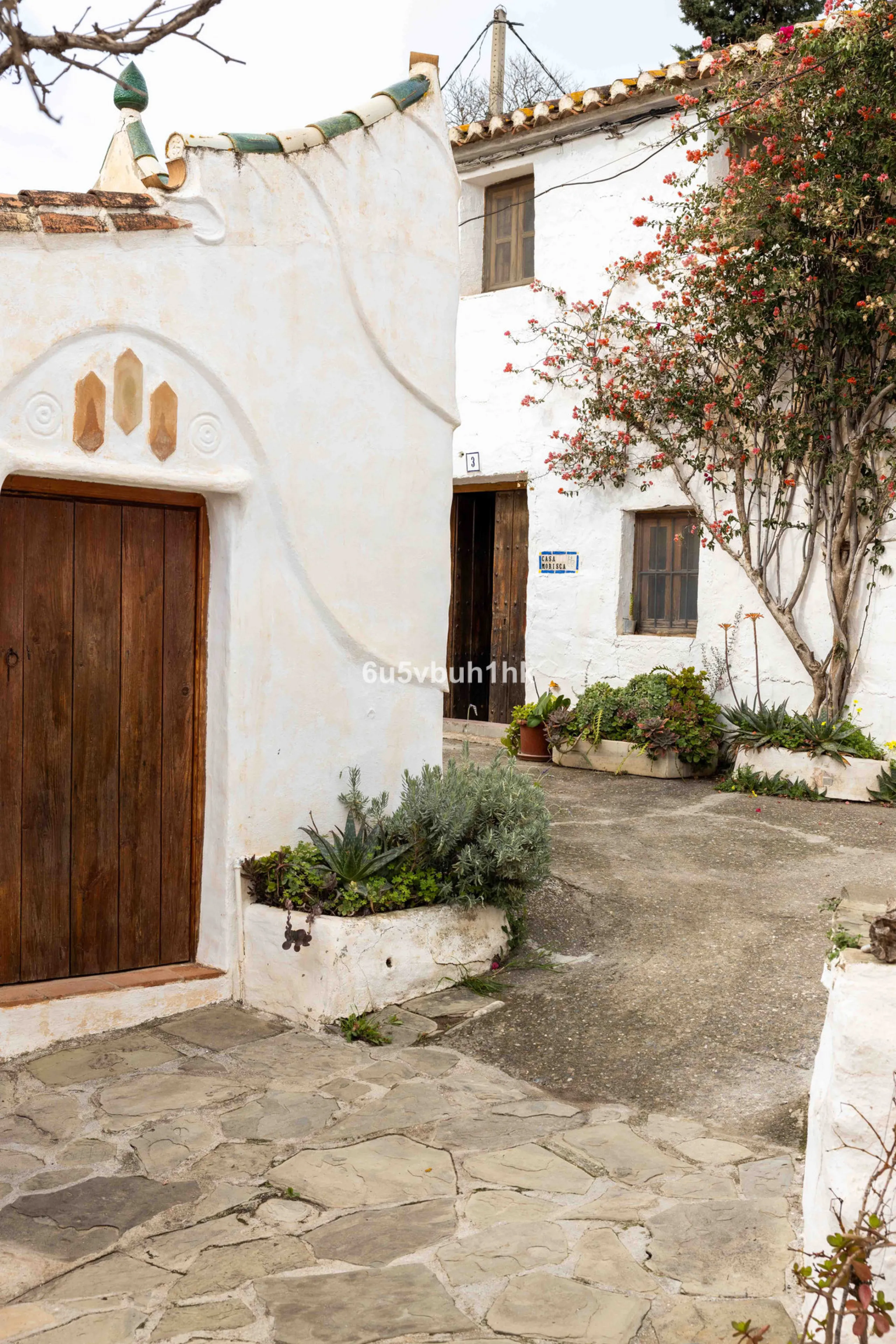 A very rare opportunity to purchase  a complete private village of 14 townhouses situated in what was once a functioning white countryside hamlet overlooking the lake with a lovely cobbled street leading to each house. These beautiful rustic style houses 