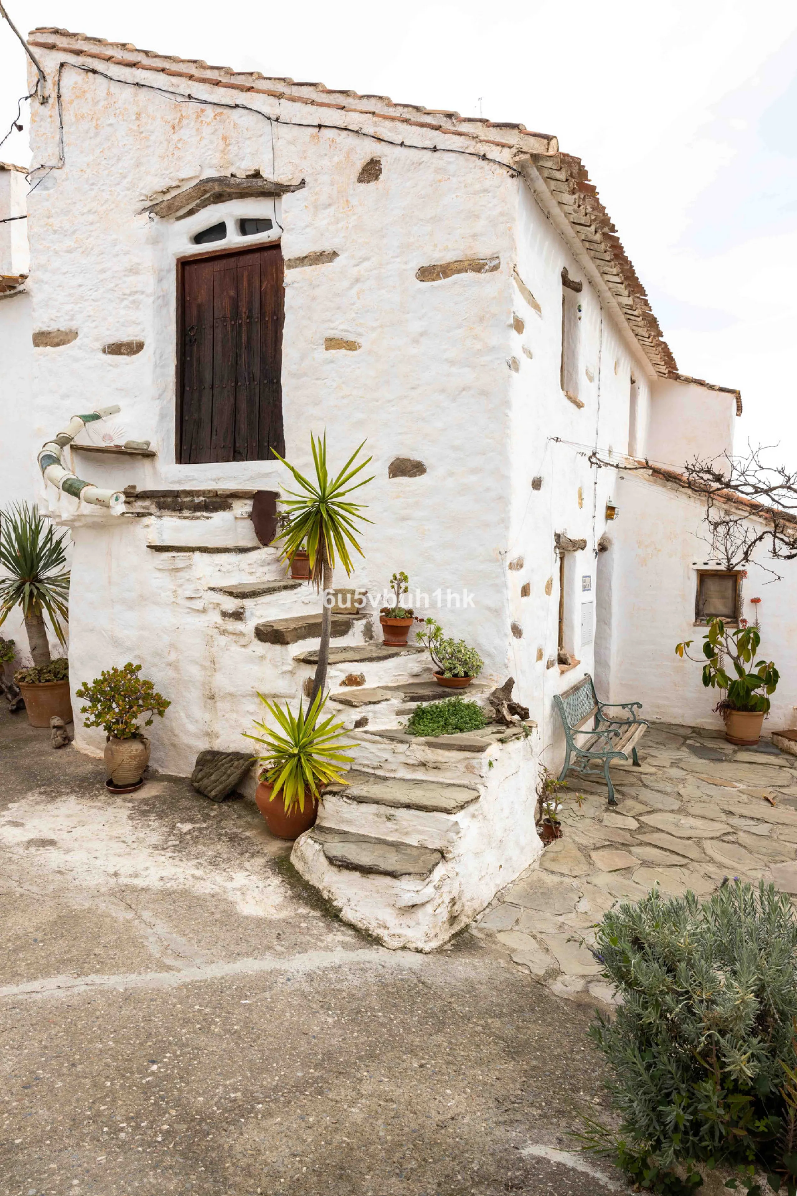 A very rare opportunity to purchase  a complete private village of 14 townhouses situated in what was once a functioning white countryside hamlet overlooking the lake with a lovely cobbled street leading to each house. These beautiful rustic style houses 