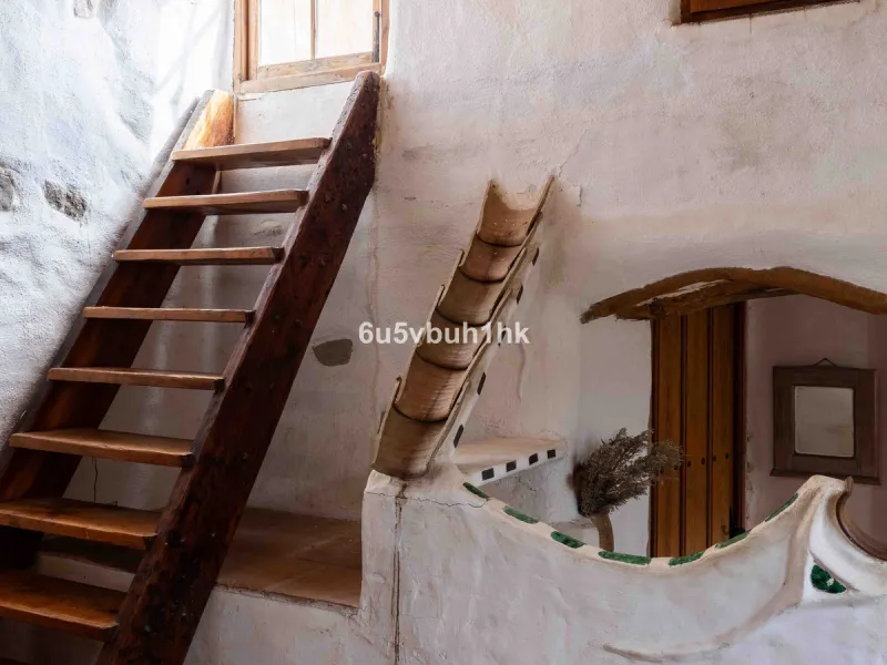 A very rare opportunity to purchase  a complete private village of 14 townhouses situated in what was once a functioning white countryside hamlet overlooking the lake with a lovely cobbled street leading to each house. These beautiful rustic style houses 