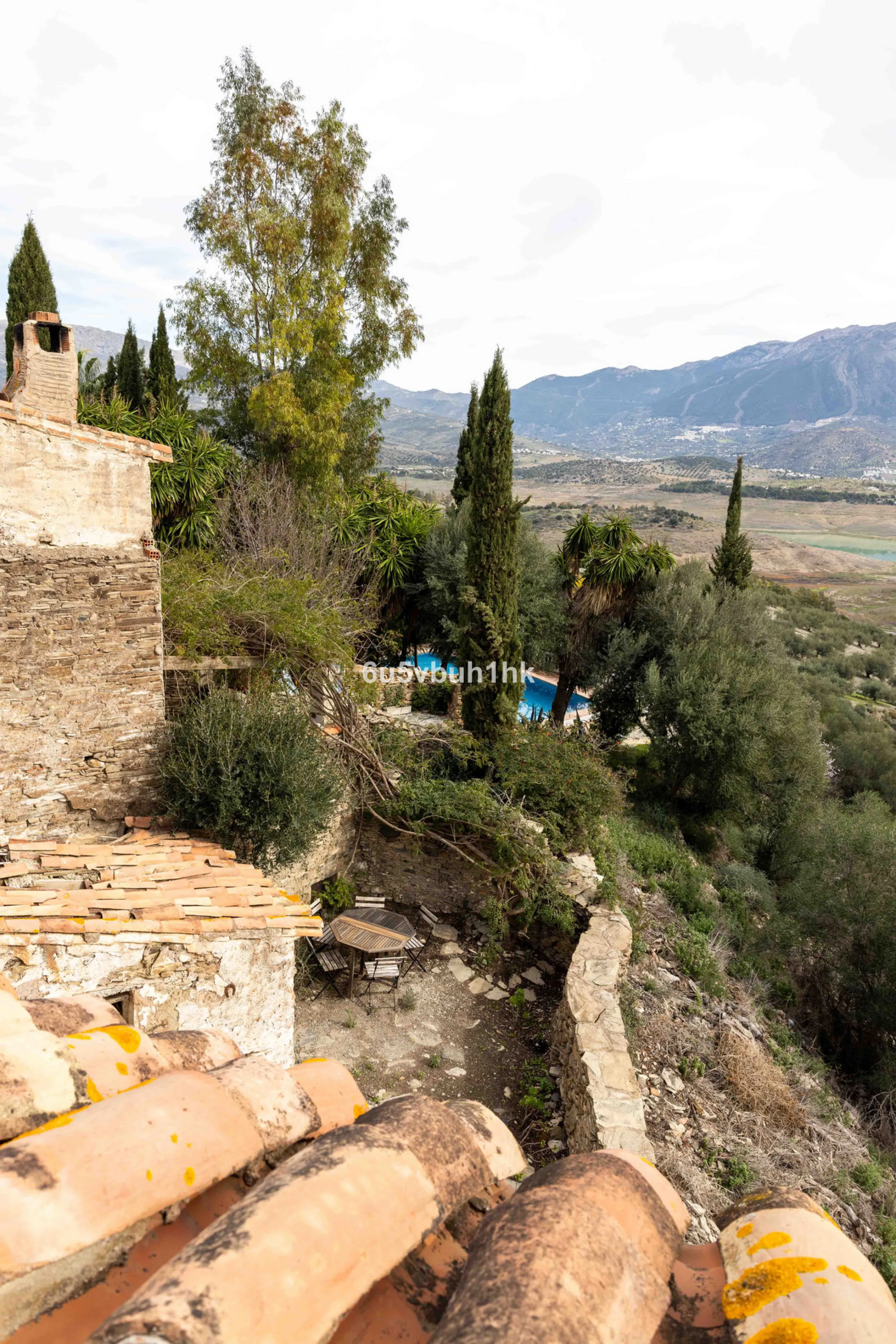 A very rare opportunity to purchase  a complete private village of 14 townhouses situated in what was once a functioning white countryside hamlet overlooking the lake with a lovely cobbled street leading to each house. These beautiful rustic style houses 