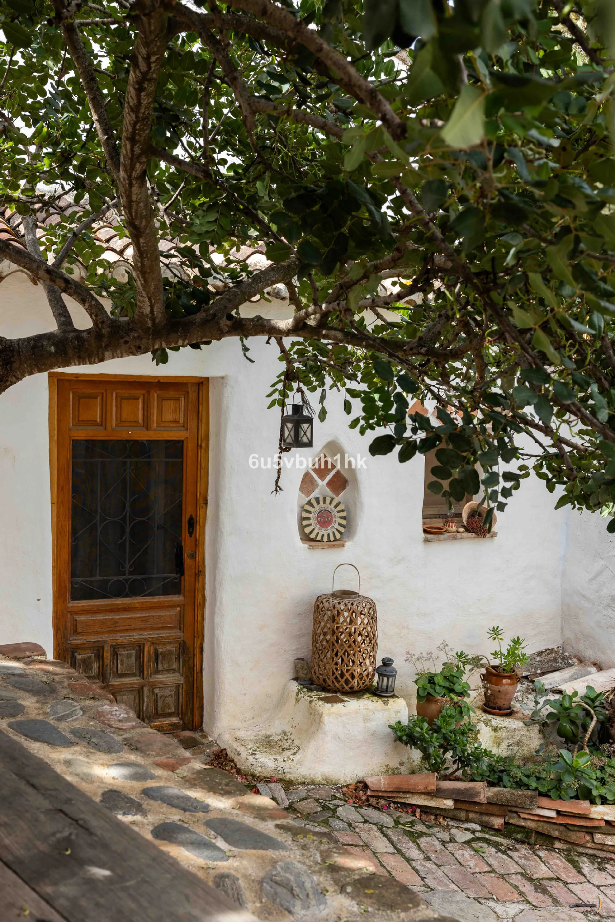 A very rare opportunity to purchase  a complete private village of 14 townhouses situated in what was once a functioning white countryside hamlet overlooking the lake with a lovely cobbled street leading to each house. These beautiful rustic style houses 