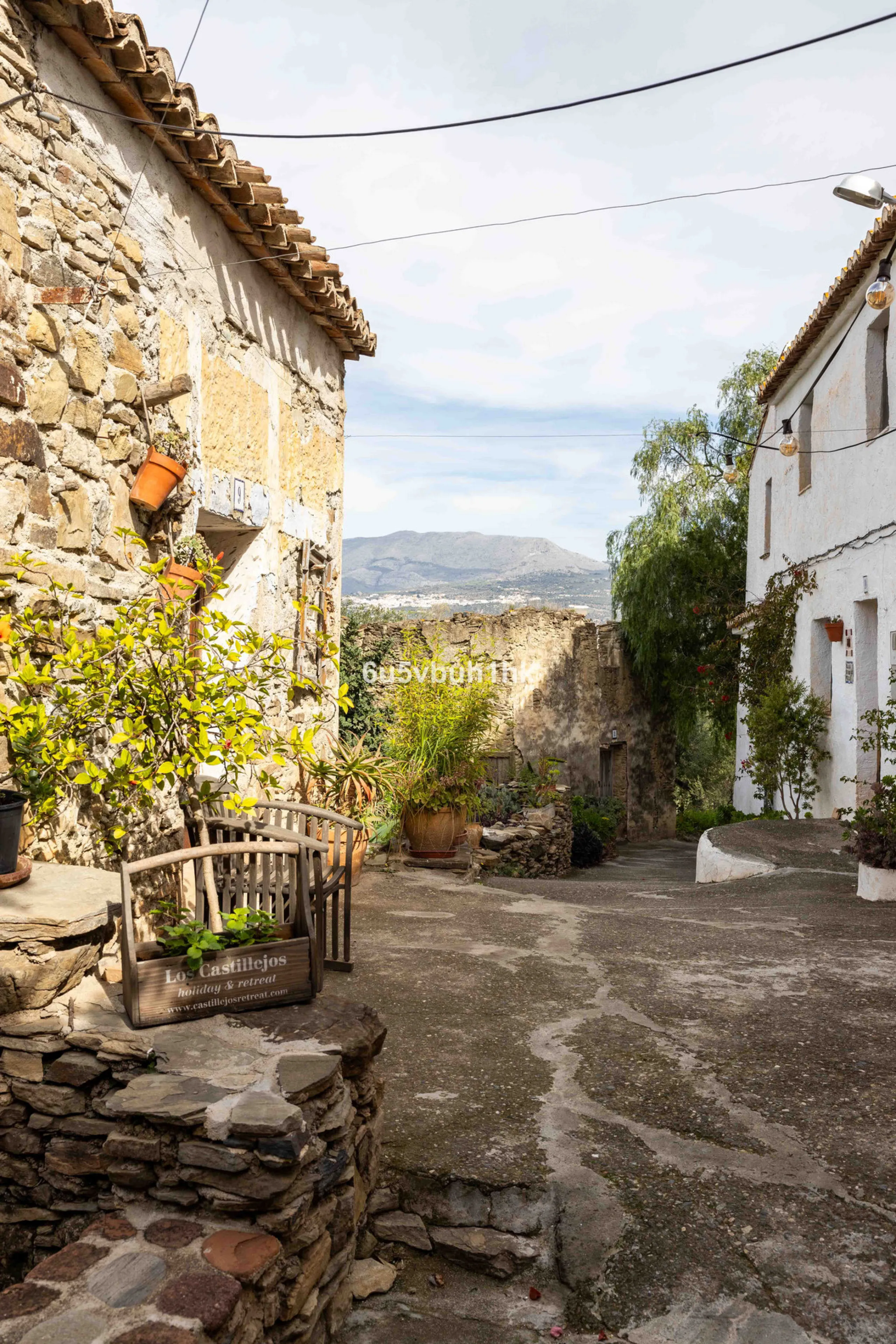 A very rare opportunity to purchase  a complete private village of 14 townhouses situated in what was once a functioning white countryside hamlet overlooking the lake with a lovely cobbled street leading to each house. These beautiful rustic style houses 