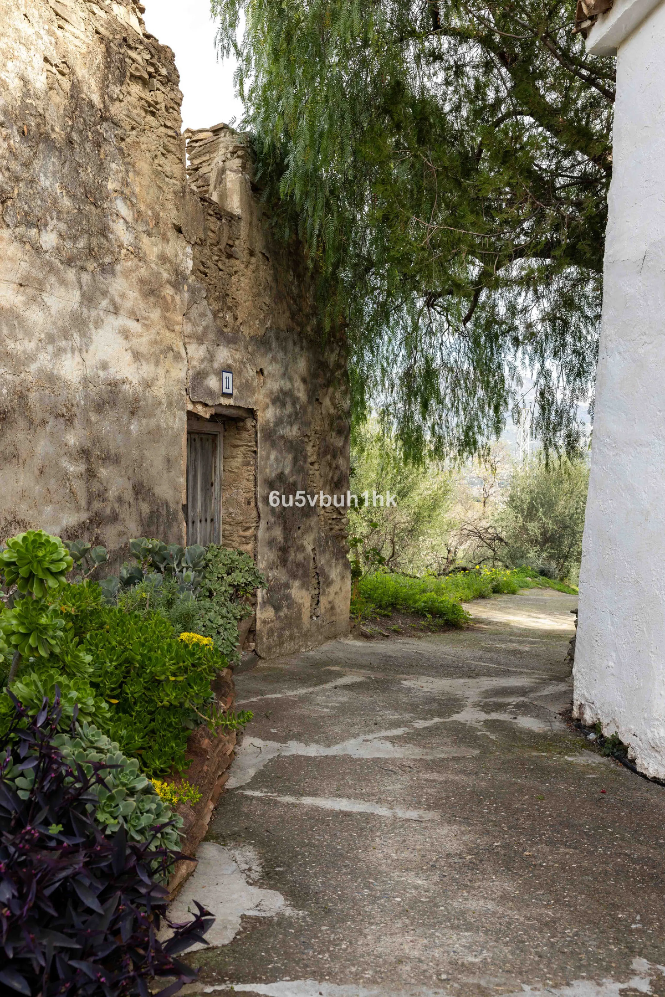 A very rare opportunity to purchase  a complete private village of 14 townhouses situated in what was once a functioning white countryside hamlet overlooking the lake with a lovely cobbled street leading to each house. These beautiful rustic style houses 