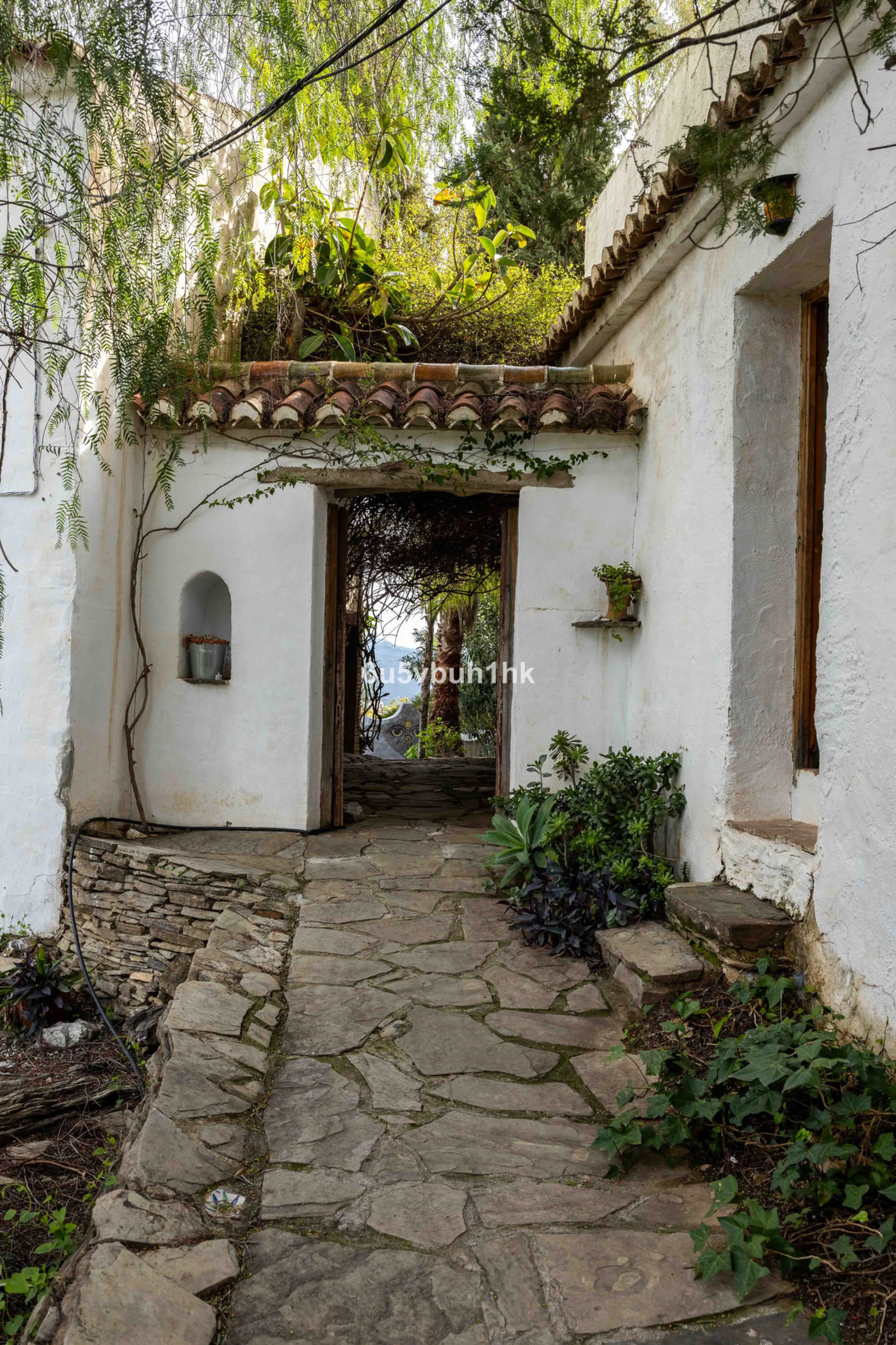 A very rare opportunity to purchase  a complete private village of 14 townhouses situated in what was once a functioning white countryside hamlet overlooking the lake with a lovely cobbled street leading to each house. These beautiful rustic style houses 