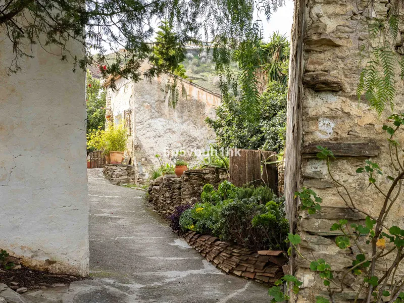 A very rare opportunity to purchase  a complete private village of 14 townhouses situated in what was once a functioning white countryside hamlet overlooking the lake with a lovely cobbled street leading to each house. These beautiful rustic style houses 