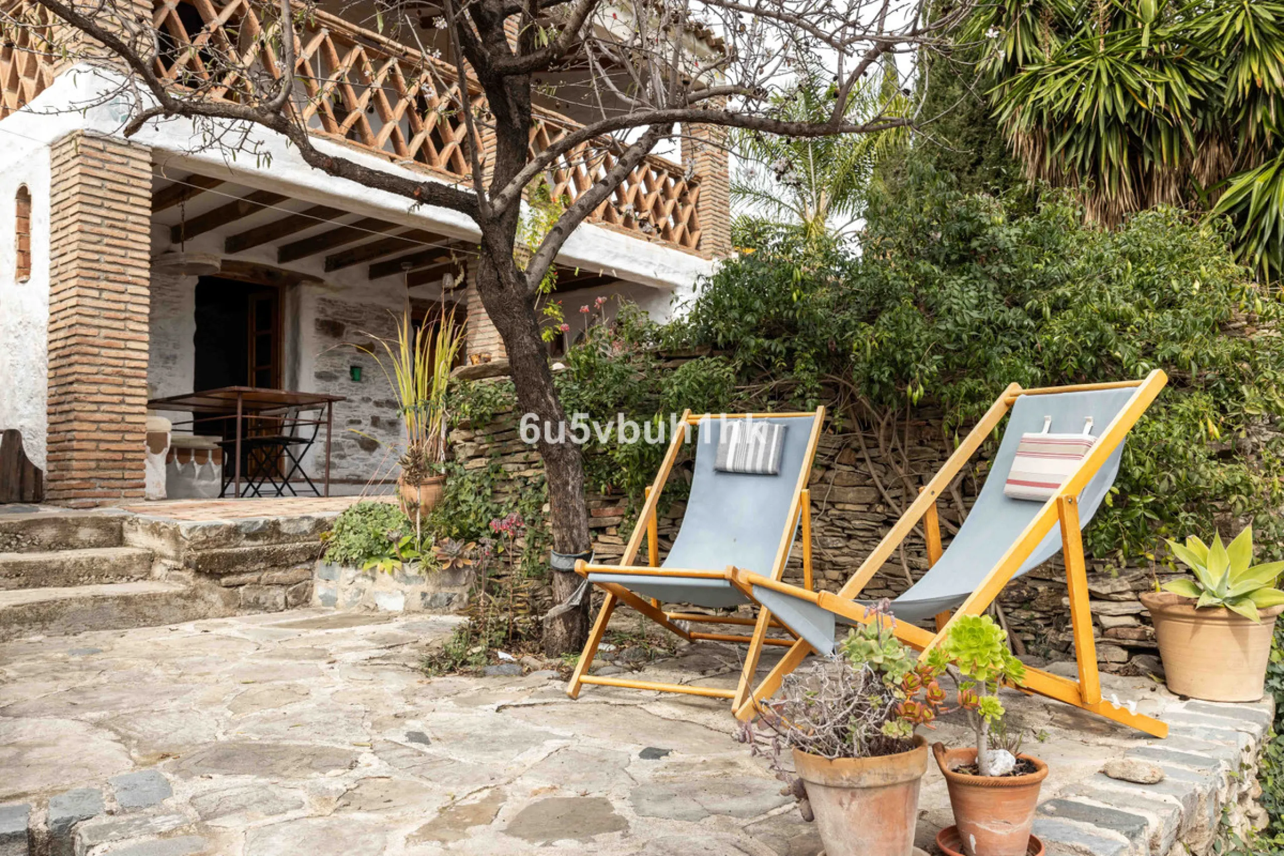A very rare opportunity to purchase  a complete private village of 14 townhouses situated in what was once a functioning white countryside hamlet overlooking the lake with a lovely cobbled street leading to each house. These beautiful rustic style houses 