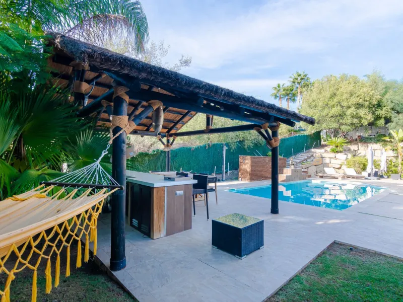 Charming detached villa located in Nueva Andalucia. Situated on a secluded private street with a secure barrier, residents enjoy peace of mind and privacy in this gated community.