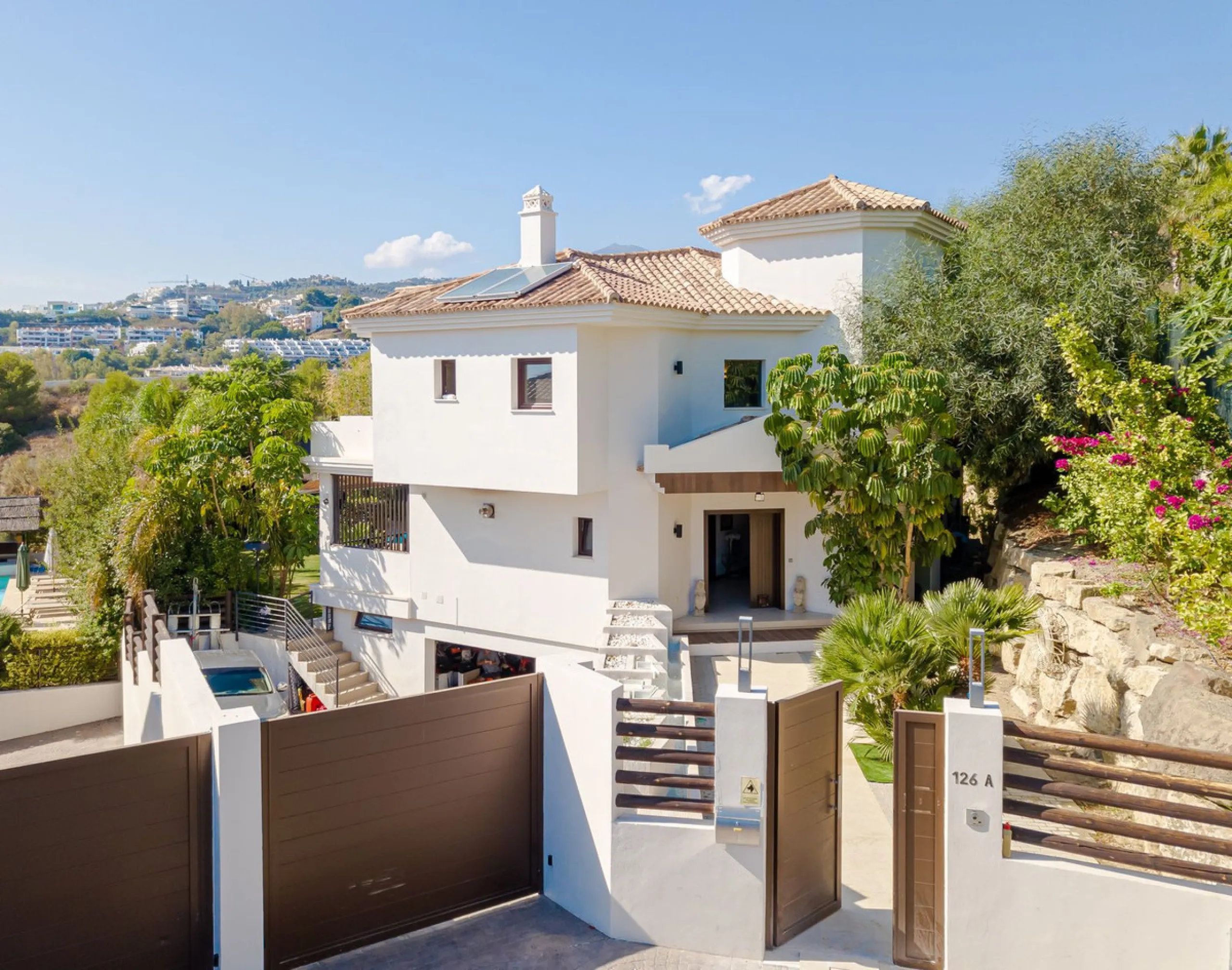 Charming detached villa located in Nueva Andalucia. Situated on a secluded private street with a secure barrier, residents enjoy peace of mind and privacy in this gated community.