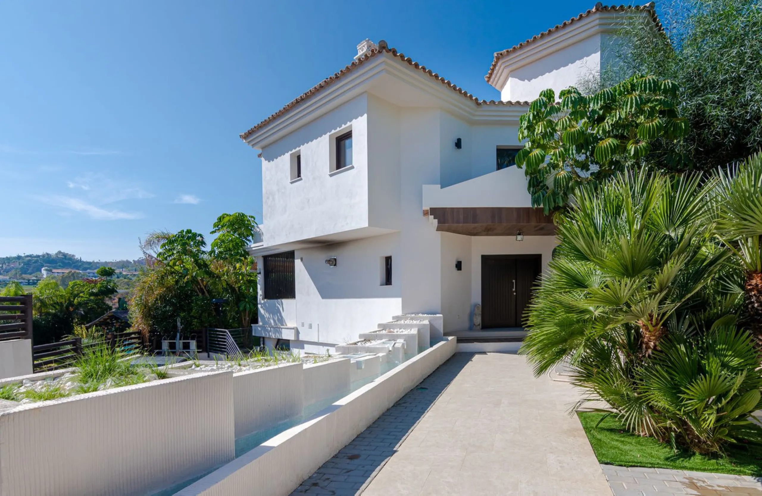 Charming detached villa located in Nueva Andalucia. Situated on a secluded private street with a secure barrier, residents enjoy peace of mind and privacy in this gated community.