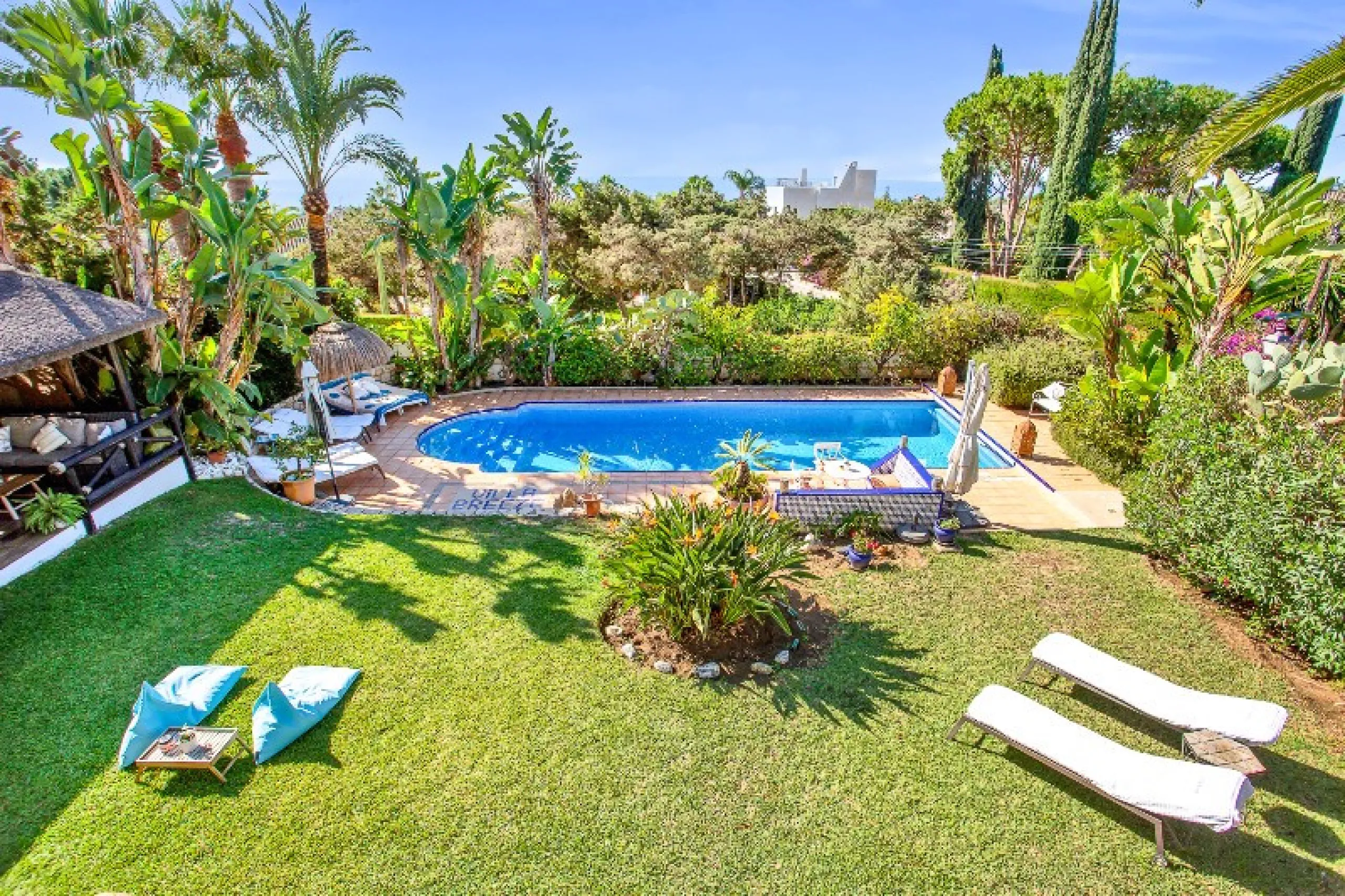 Luxury family villa in MARBESA, one of the most exclusive areas of Marbella. A desirable large open-plan villa on a flat south-west facing plot with mature landscaped gardens and large heated pool, and with wonderful panoramic sea views, only a few minute