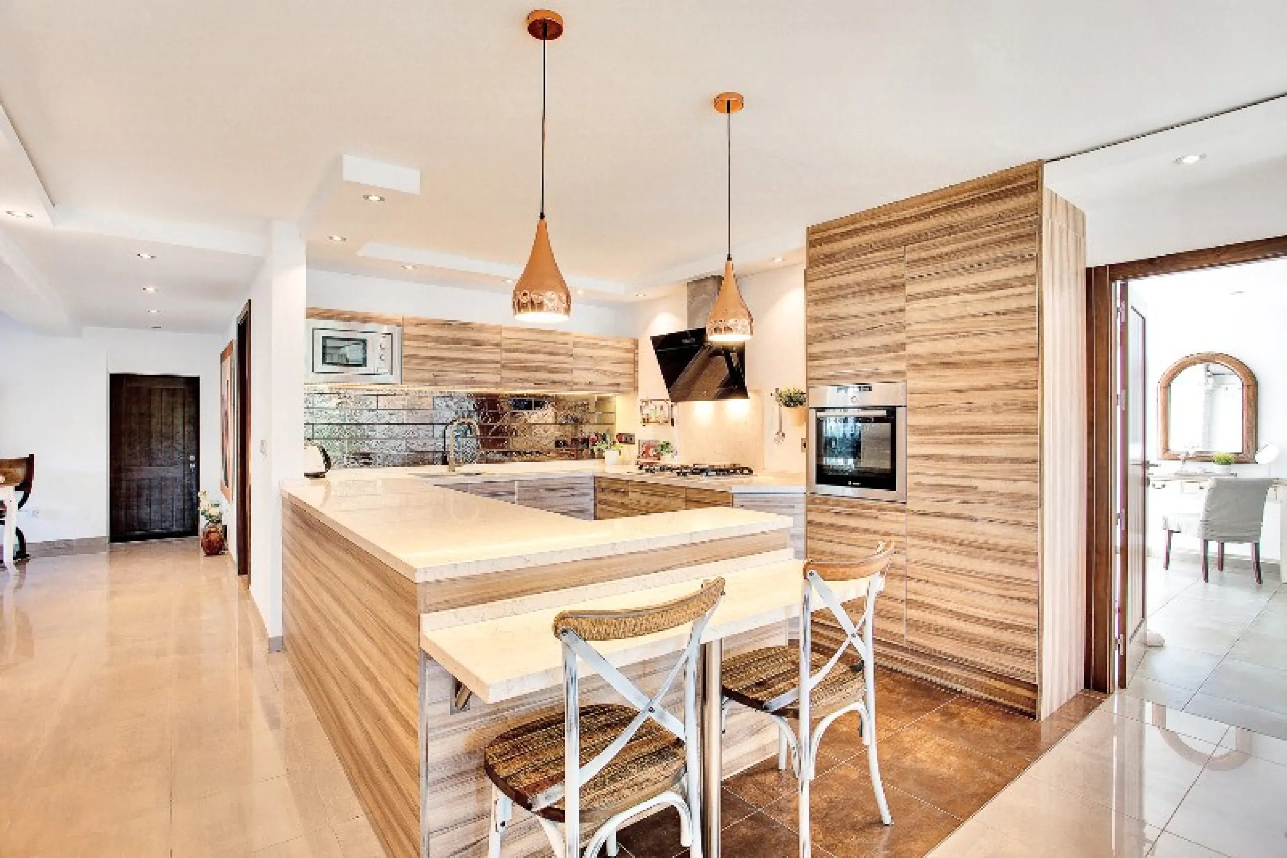 Luxury family villa in MARBESA, one of the most exclusive areas of Marbella. A desirable large open-plan villa on a flat south-west facing plot with mature landscaped gardens and large heated pool, and with wonderful panoramic sea views, only a few minute