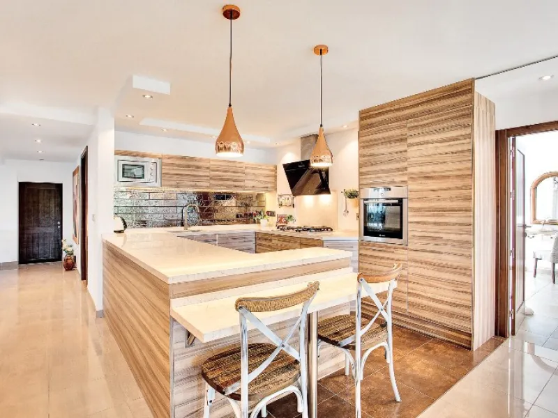 Luxury family villa in MARBESA, one of the most exclusive areas of Marbella. A desirable large open-plan villa on a flat south-west facing plot with mature landscaped gardens and large heated pool, and with wonderful panoramic sea views, only a few minute