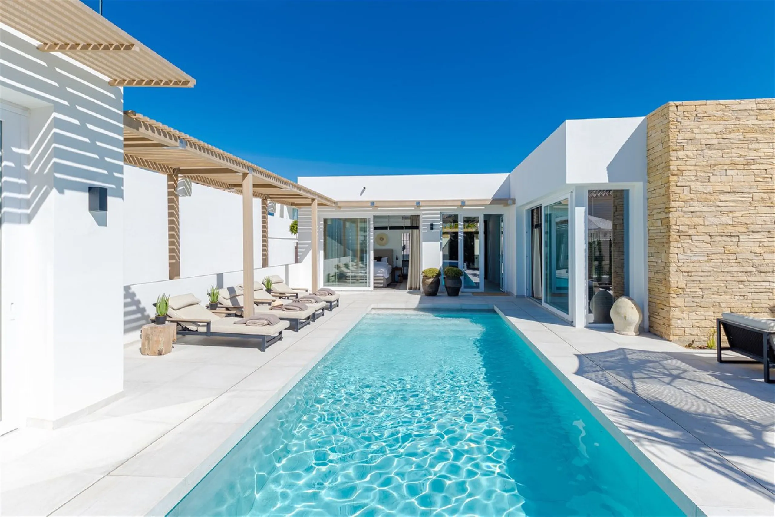 9 BEDROOM SOUTH-WEST FACING LUXURIOUS VILLAS WITH 2 HEATED SWIMMING POOLS, CINEMA ROOM, GYM AND WINE BODEGA CLOSE TO THE BEACH.