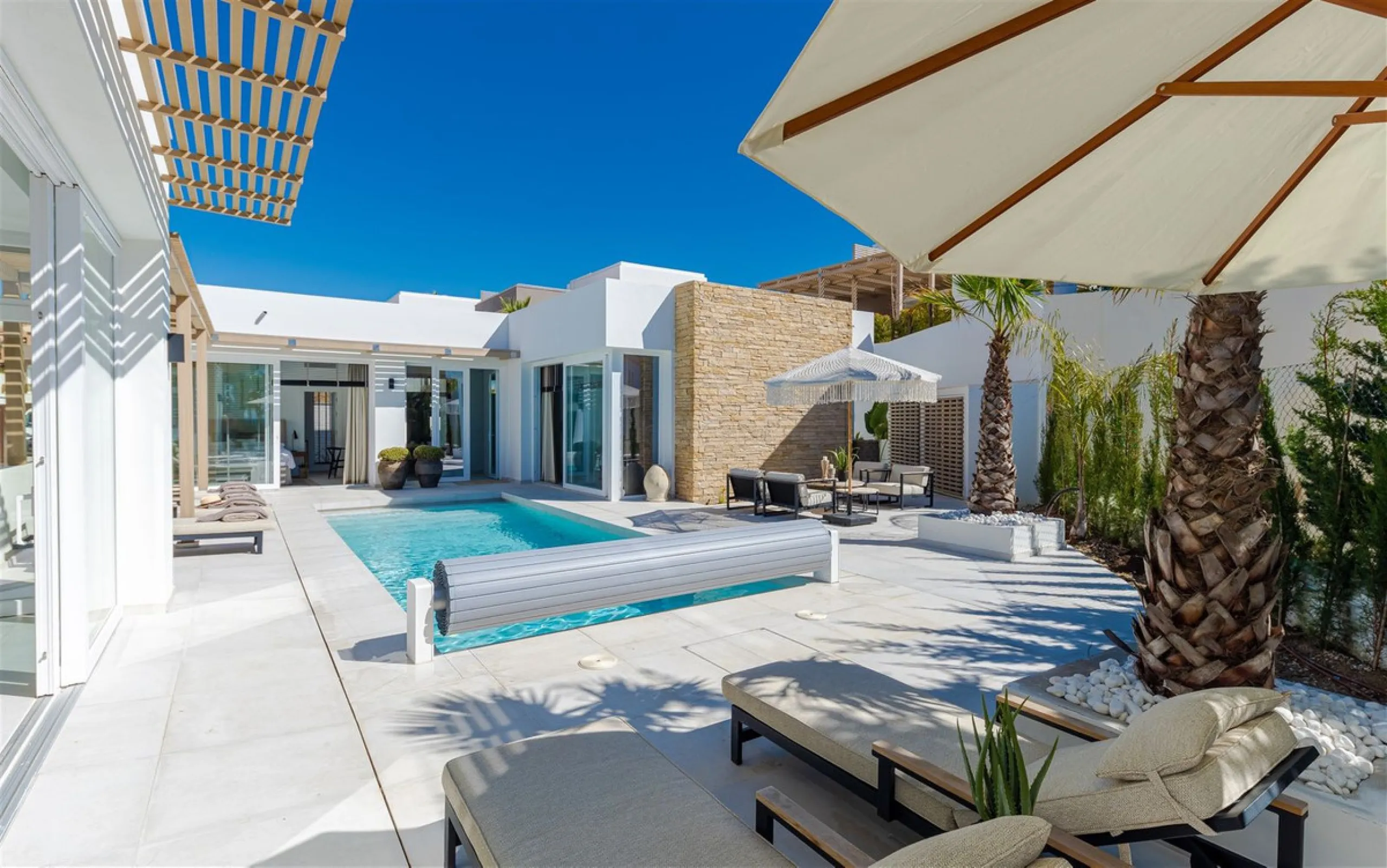 9 BEDROOM SOUTH-WEST FACING LUXURIOUS VILLAS WITH 2 HEATED SWIMMING POOLS, CINEMA ROOM, GYM AND WINE BODEGA CLOSE TO THE BEACH.