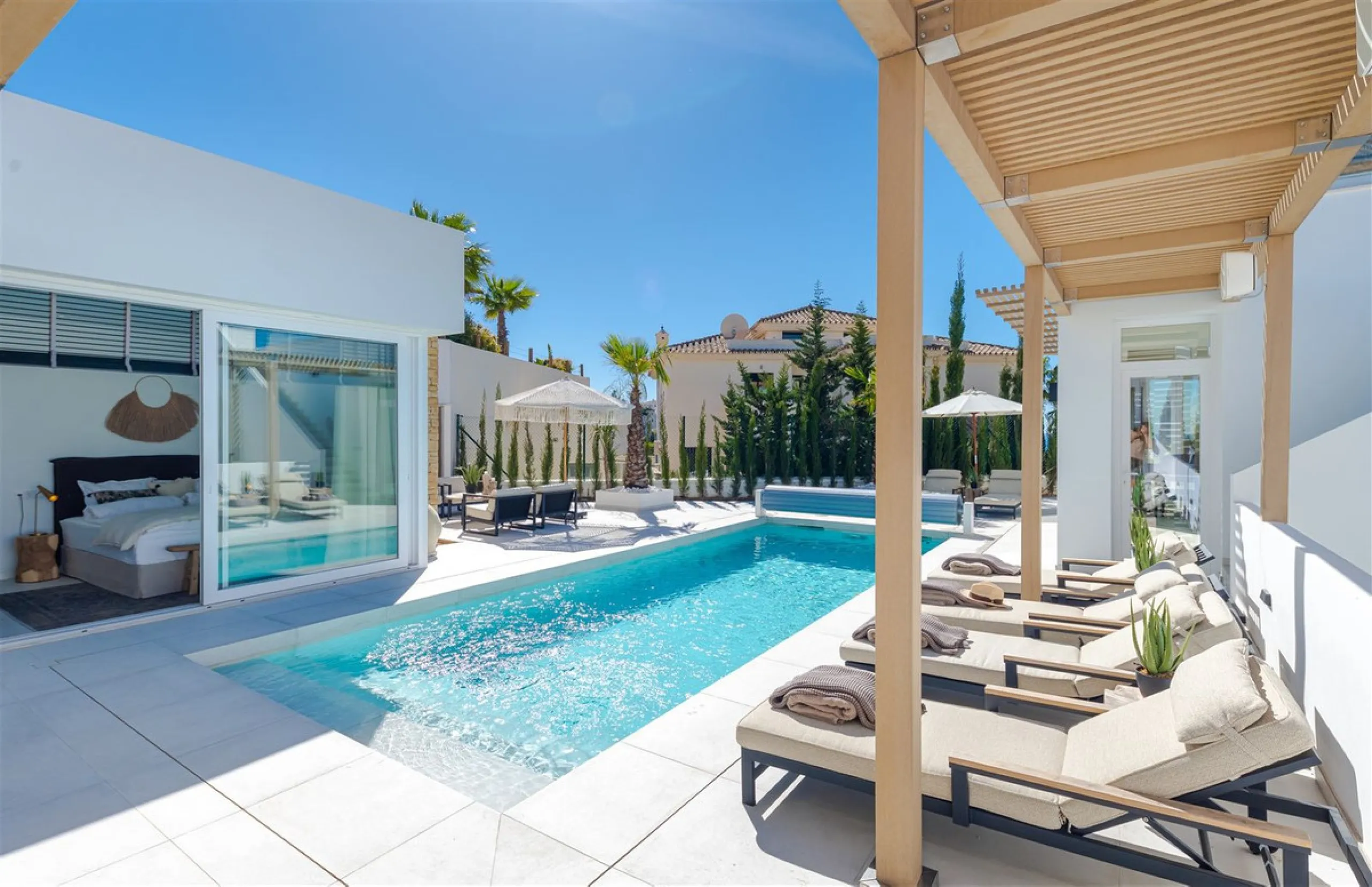 9 BEDROOM SOUTH-WEST FACING LUXURIOUS VILLAS WITH 2 HEATED SWIMMING POOLS, CINEMA ROOM, GYM AND WINE BODEGA CLOSE TO THE BEACH.