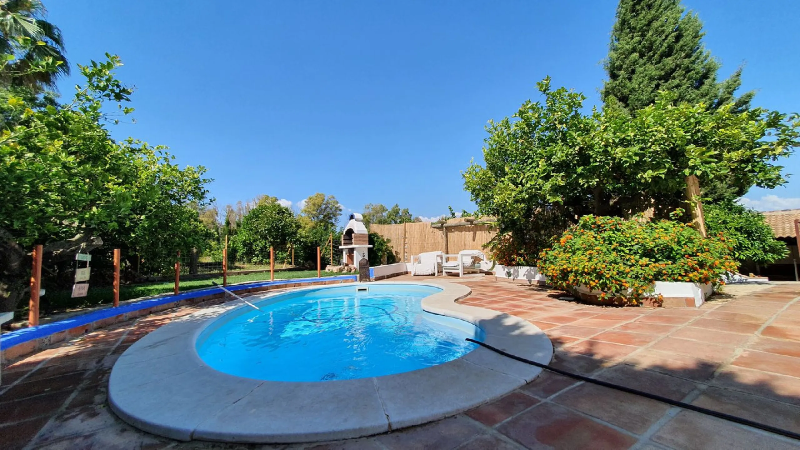 Charming Country Property for sale featuring two houses and two apartments, along with two swimming pools. This property holds a licence for rural tourism and is conveniently located very close to the town, surrounded by a fence ensuring privacy and secur