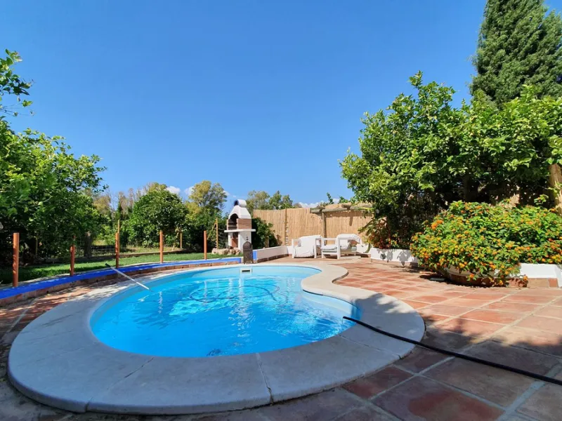 Charming Country Property for sale featuring two houses and two apartments, along with two swimming pools. This property holds a licence for rural tourism and is conveniently located very close to the town, surrounded by a fence ensuring privacy and secur