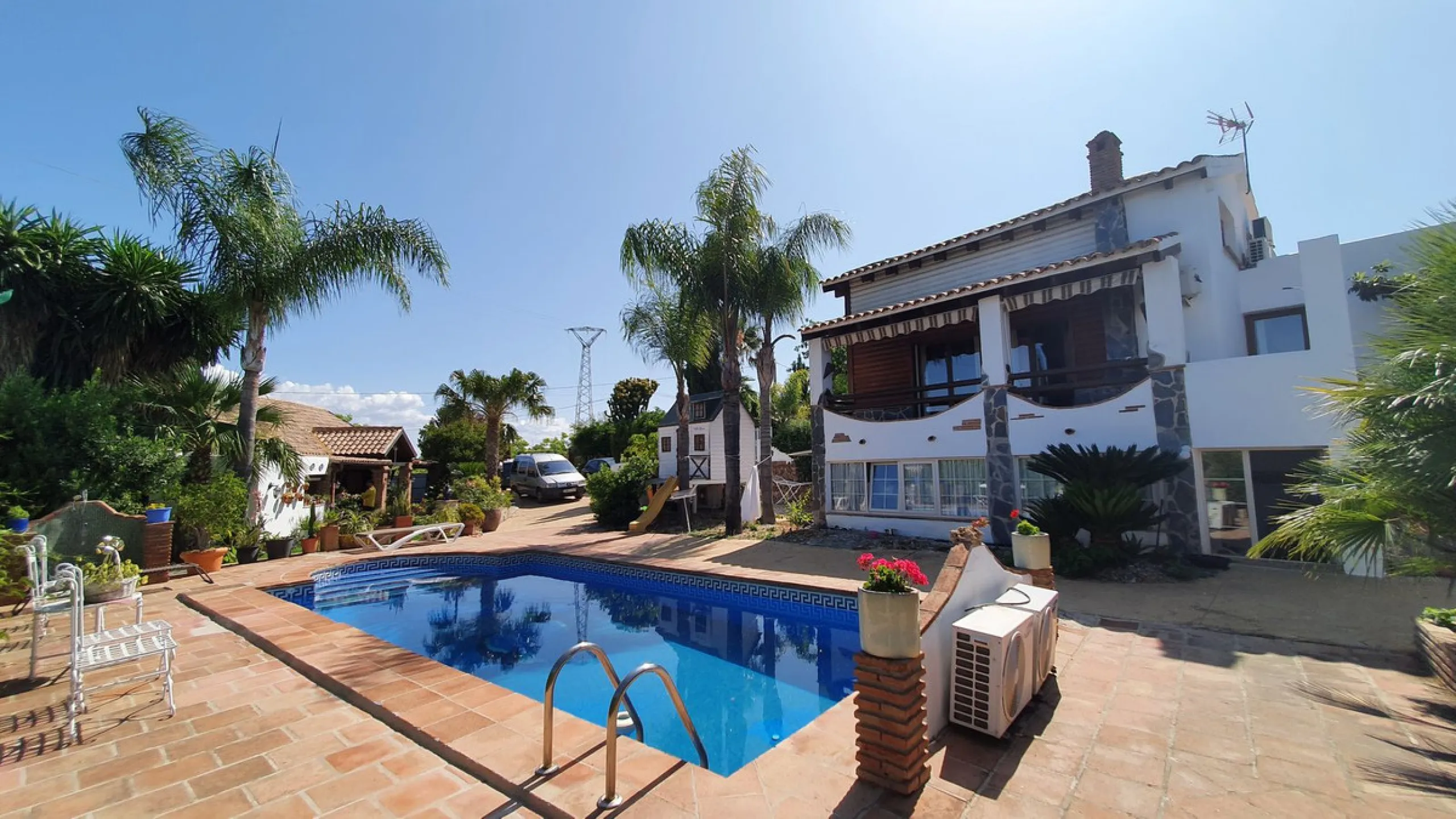 Charming Country Property for sale featuring two houses and two apartments, along with two swimming pools. This property holds a licence for rural tourism and is conveniently located very close to the town, surrounded by a fence ensuring privacy and secur