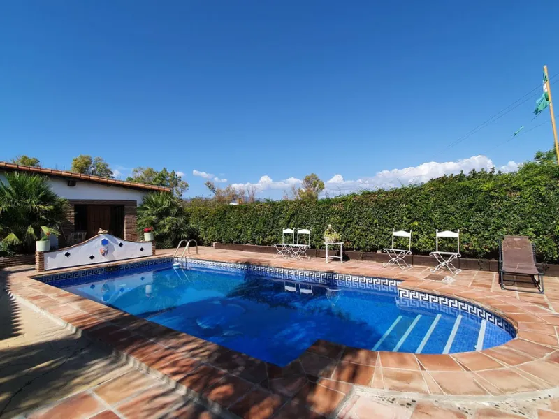 Charming Country Property for sale featuring two houses and two apartments, along with two swimming pools. This property holds a licence for rural tourism and is conveniently located very close to the town, surrounded by a fence ensuring privacy and secur